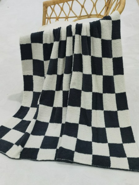 Square black and white polyester knit throw